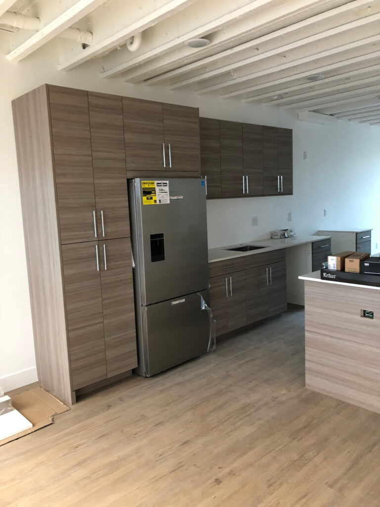 Installing custom built cabinets and kitchen island